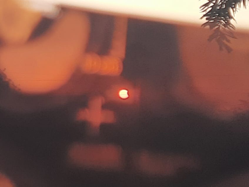 SOLAR ECLIPSE WATCHED Students watched the Solar Eclipse with filtered film medium and are explained the astronomical phenomenon