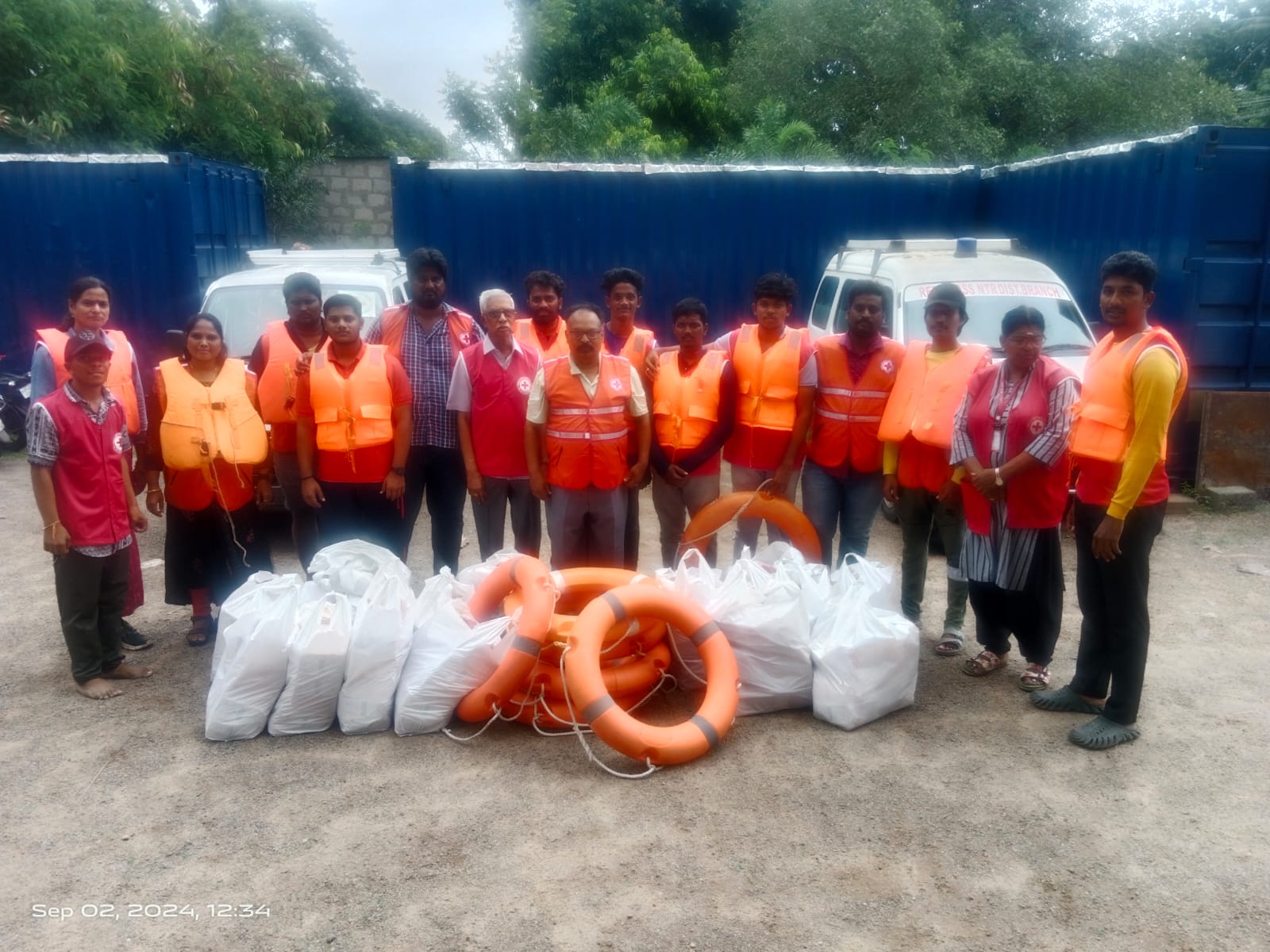 DISTRIBUTION OF FOOD AND HELPING FLOOD VICTIMS IN VIJAYAWADA